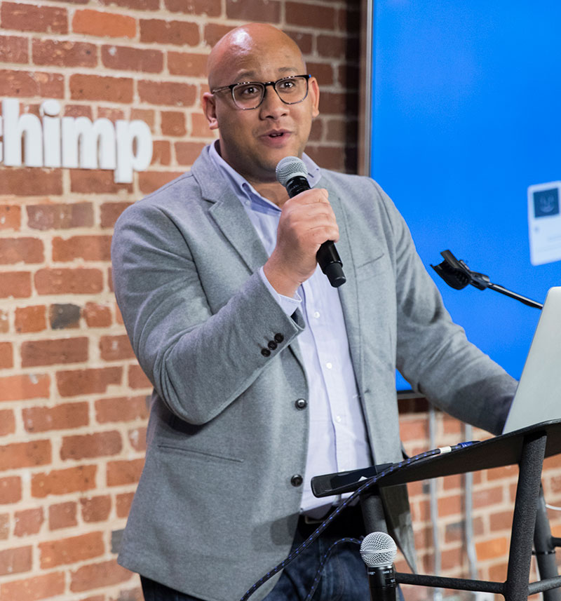 Student at MailChimp at podium