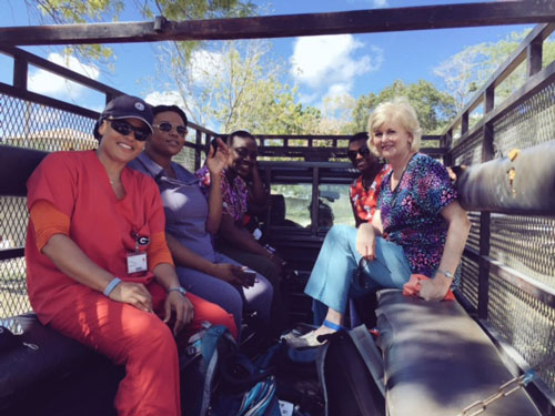 Clayton State students and employees riding in truck