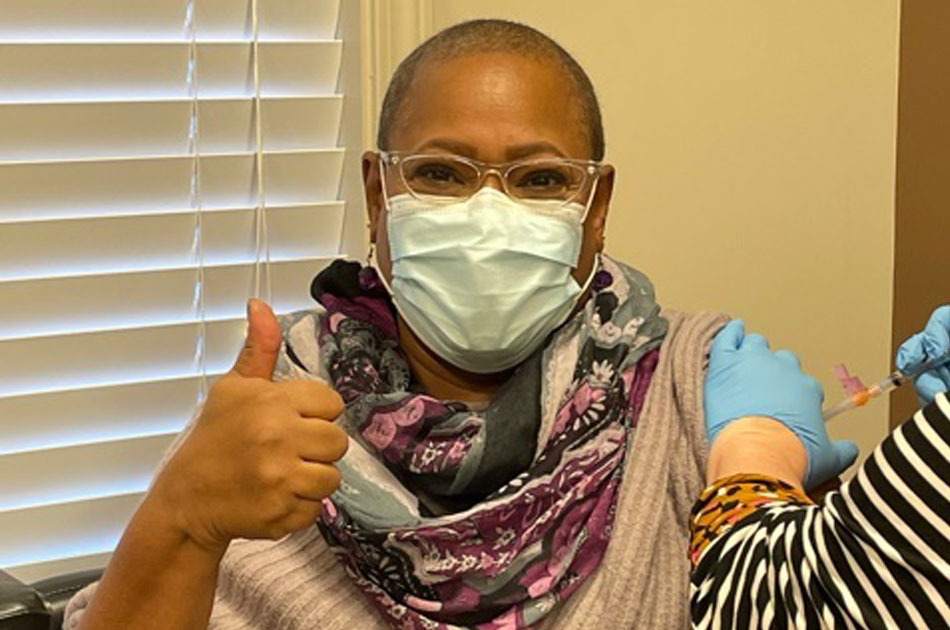 Employee getting her vaccine