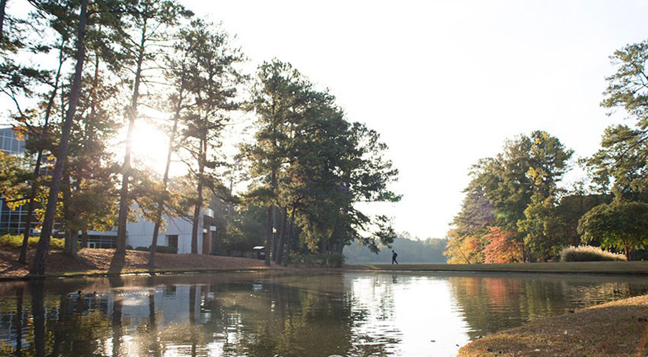 The sun rises over Clayton State's University Center