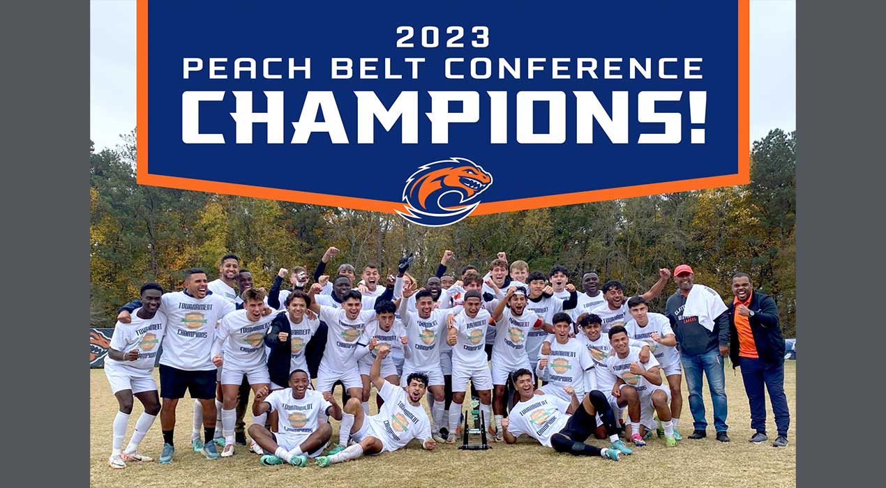 The 2023 Men's Soccer team celebrates its 2023 PBC Championship victory over rival Lander