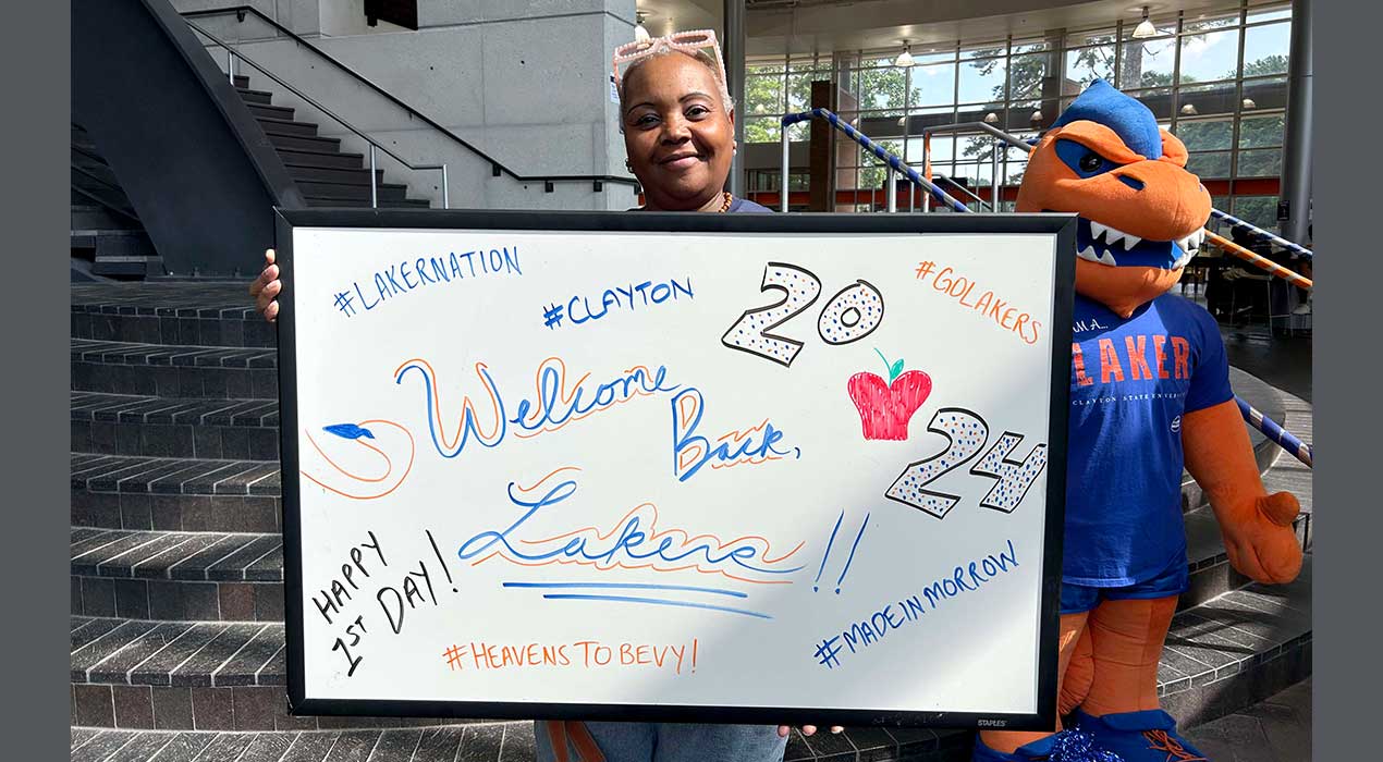 Clayton State veteran staff member Heidi Benford welcomes students back to campus